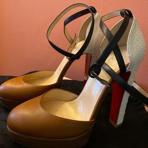 Louboutin snakeskin pumps size 8.5